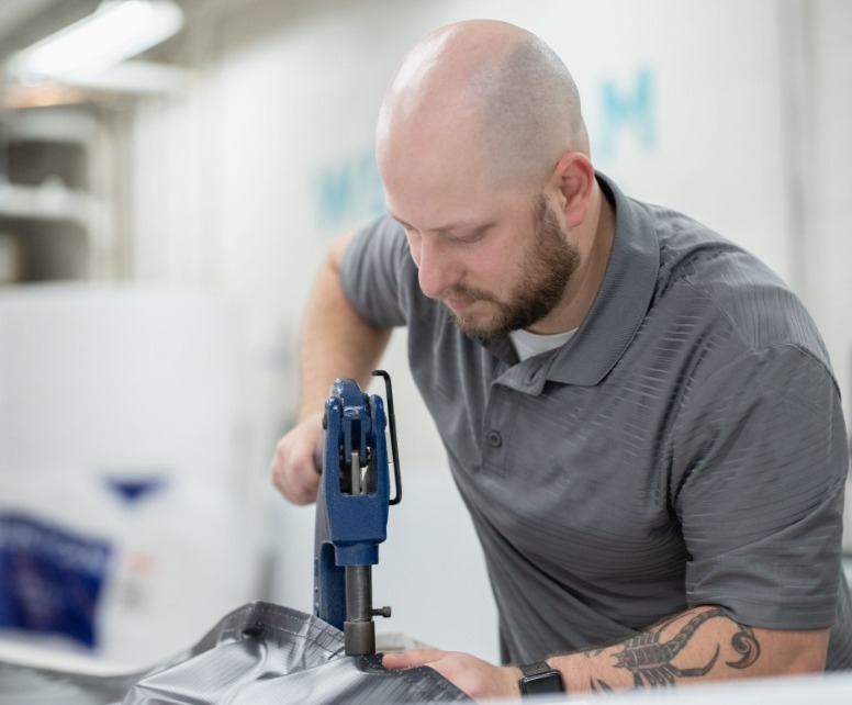 Person creating a custom sign design